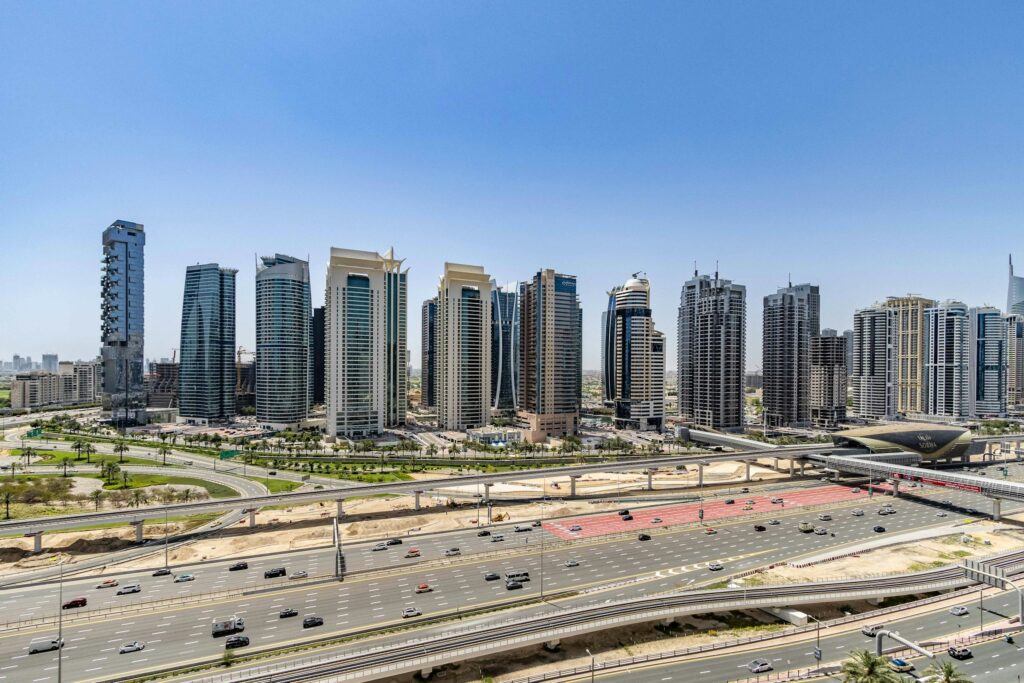 Jumeirah Lake Towers glass high rises beside the lake, Dubai